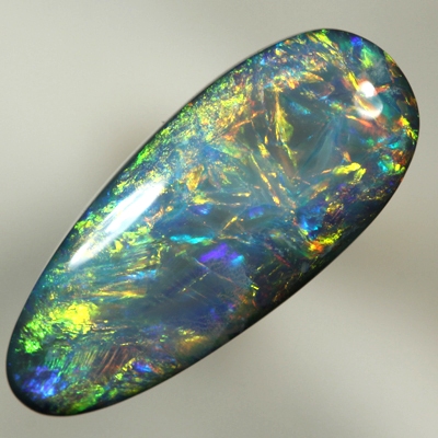 SOLID BLACK OPAL 3480 Beautiful bright burning orange together with green and blue. Top quality, always moving fire. SEE VIDEO